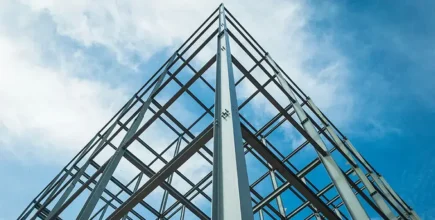 Structure of steel for building construction on sky background.